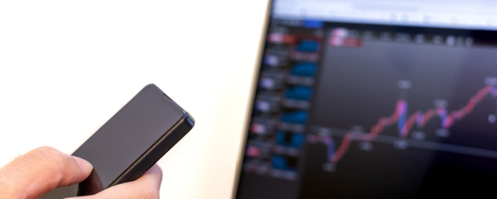 What are spreads and commissions in FX trading?